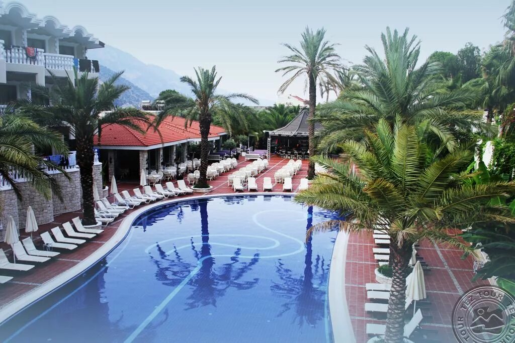 Flamingo hotel oludeniz. Flamingo Spa Олюдениз. Отель Фламинго Фетхие. Фетхие Фламинго отель Олюдениз. Flamingo Hotel Oludeniz 4 Турция.