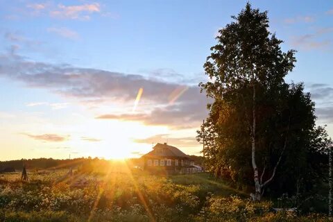 Село солнце за городом