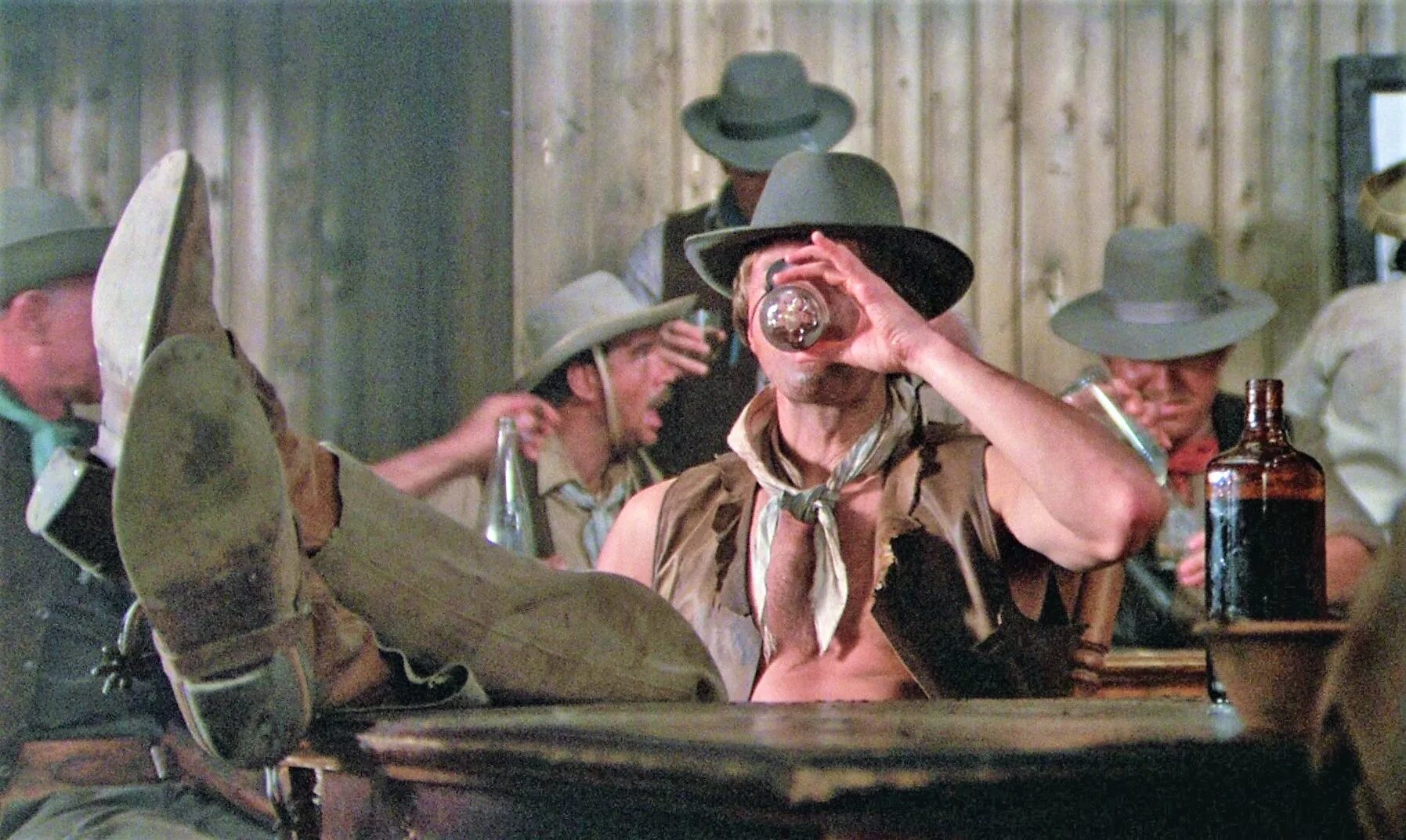 ковбой джентльмен и йог. за столом сидят ковбой. вестерн ковбои дикий запад салун. загадка за столом сидят ковбой. энди томас картины дикий запад покер.