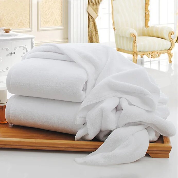 Белое банное полотенце. Полотенца для гостиниц. Hotel Towel. Bath Towels Hotel. Банное полотенце с белым кроликом.
