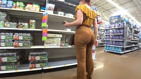 Well we continue with candid photography in supermarkets, now we see a youn...