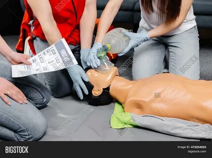 Woman Holding Breathing Bag Ambu Bag.demonstrating Cpr Cardiopulmonary Resu...