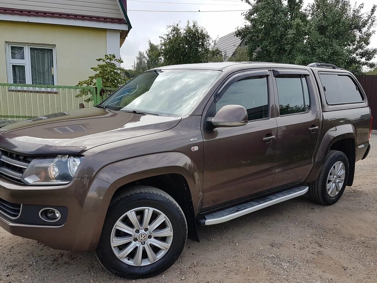 Купить амарок дизель. Amarok Volkswagen коричневый. Амарок 2013. Фольксваген Амарок 2013. Амарок 2013 коричневый.