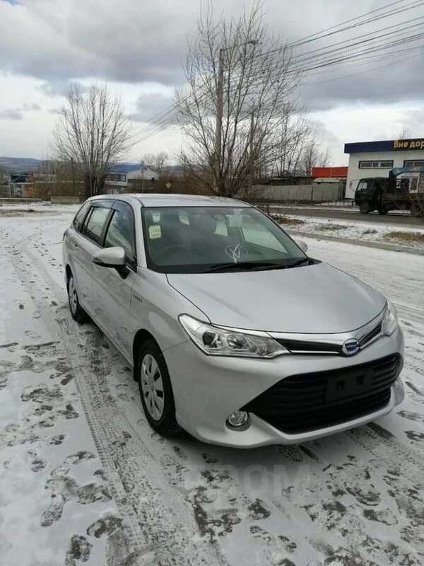 Toyota corolla fielder hybrid. Toyota corolla fielder 2015 гибрид. Тойота филдер гибрид 2016. Тойота королла филдер 2015 гибрид. Филдер гибрид 2015.