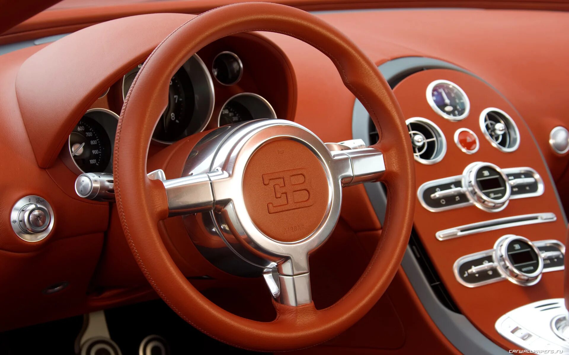 Ferrari f12 berlinetta салон. руль bugatti chiron. руль мерседес 2022. бугатти чирон 2016. бугатти вейрон 2010.
