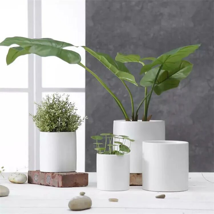 Planter pots image by KONCEPTUS Design on KHILIA Collection Planters, Party hall