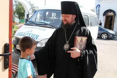 Священник и мальчик