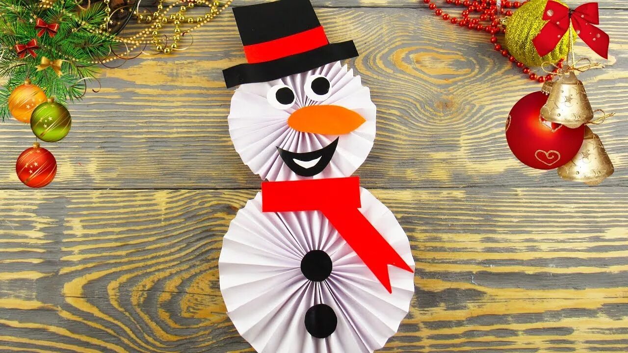 Снеговик поделка в детский сад. Снеговик из бумаги. Поделка Снеговик из бумаги. Снег для поделки. Подделка снеговикиз бумаги.