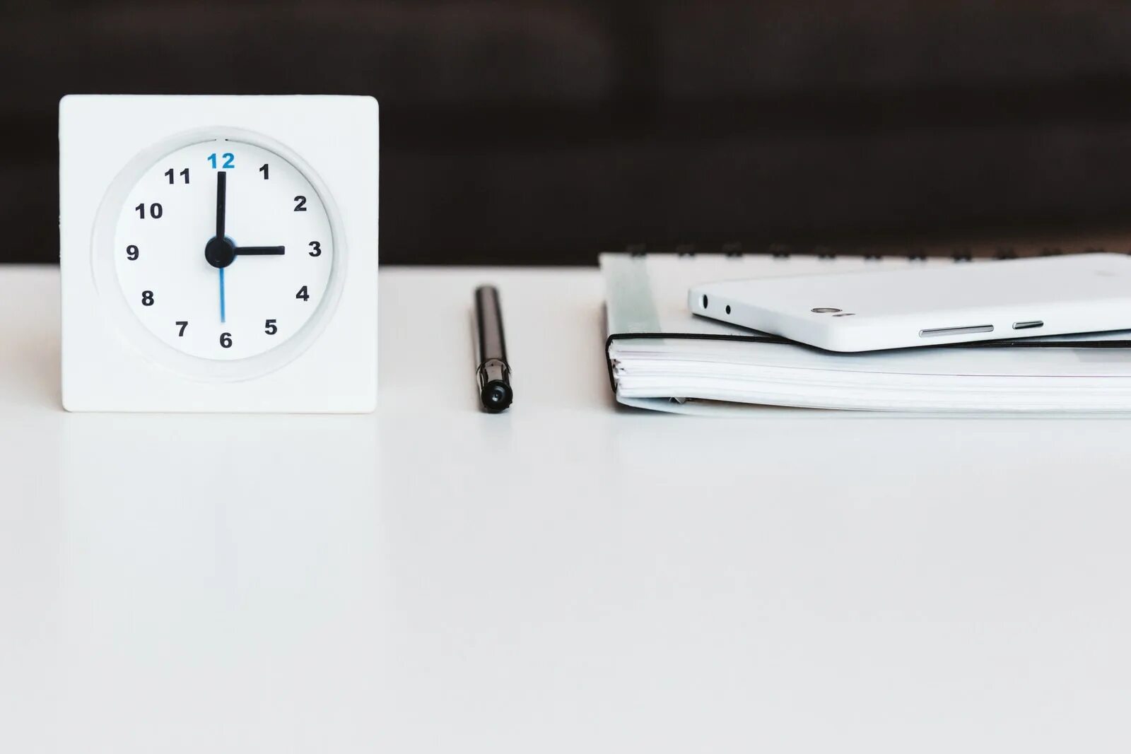 The clock is the desk