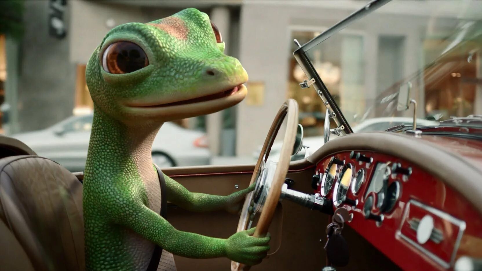 Look the lizard in the sun. Геккон Geico insurance. Гико (Geico). Геккон персонаж. Geico реклама.