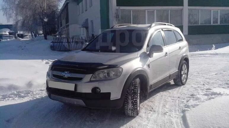 Chevrolet Captiva 2007 серебристый. Серебристая Каптива с гос номерам 707.