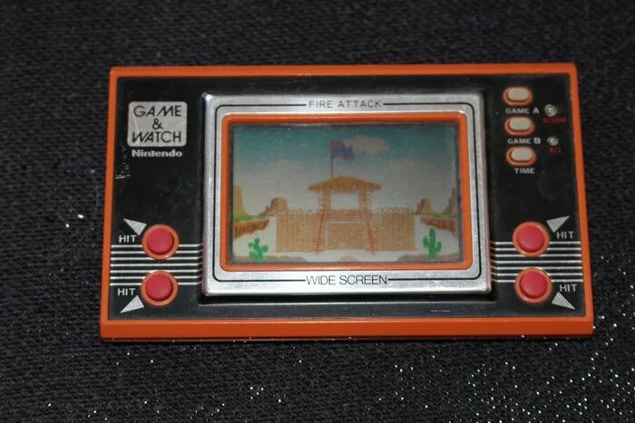 Nintendo fire. Нинтендо гейм энд вотч. "Fire Attack Nintendo game and watch. Game and watch. Подставка для game and watch.