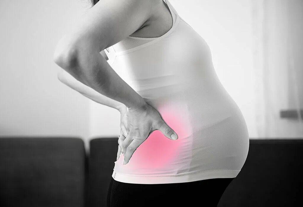 Беременность спина болит поясница. Животик беременной. Спина у беременных. Боли в пояснице при беременности. Походка беременной женщины.