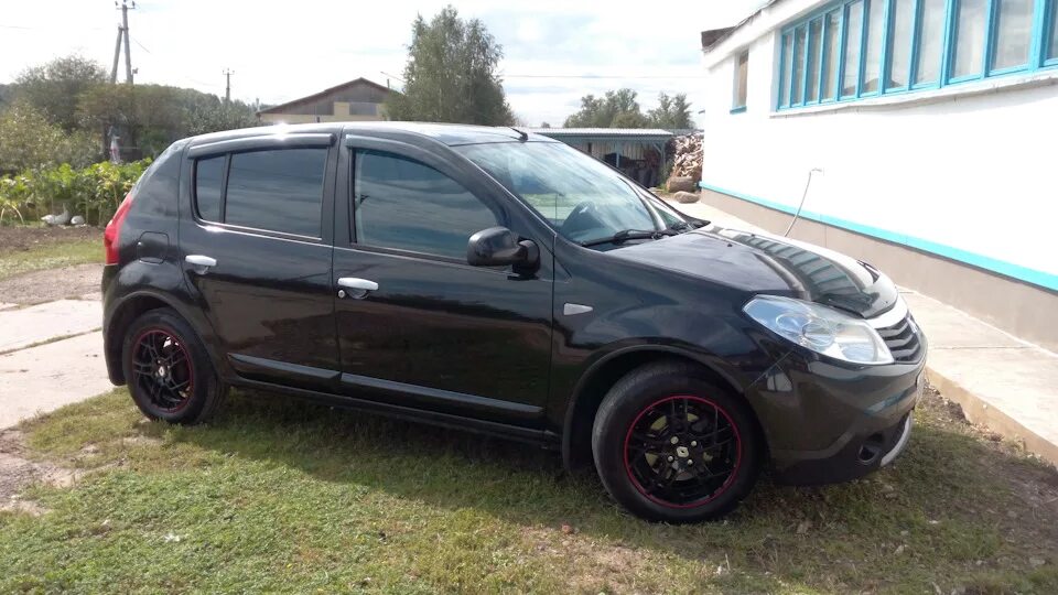 Диски рено сандеро фото Диски на машине Renault Sandero 1G, 1,6 л, 2011 года колёсные диски DRIVE2