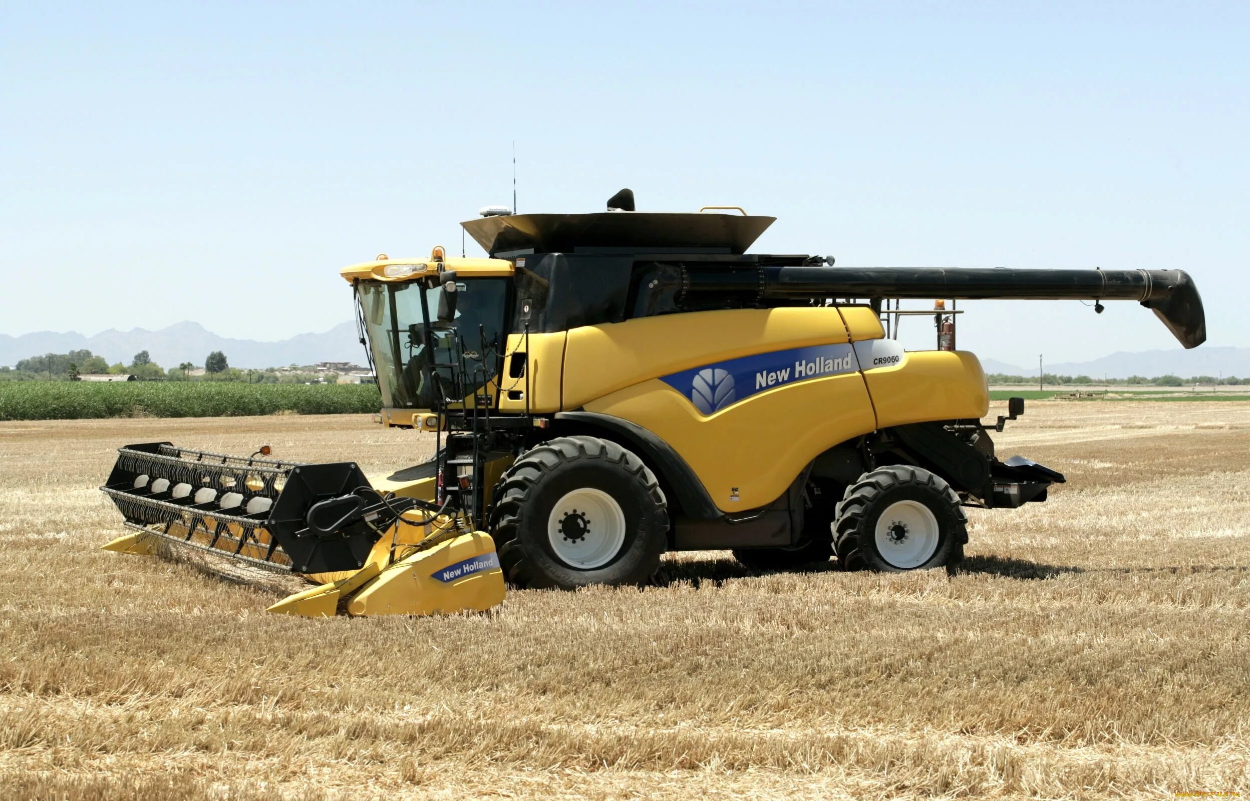 90. Нев холланд комбайн. Зерноуборочный комбайн холанд тс. New holland cr10. 90 нью холланд.
