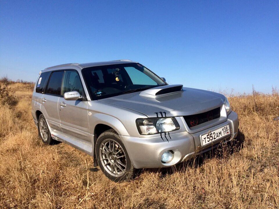 Форестер красноярске купить. Субару Форестер 2002. Subaru Forester SG 2002. Subaru Forester 2002 2.5. Субару форик 2002.