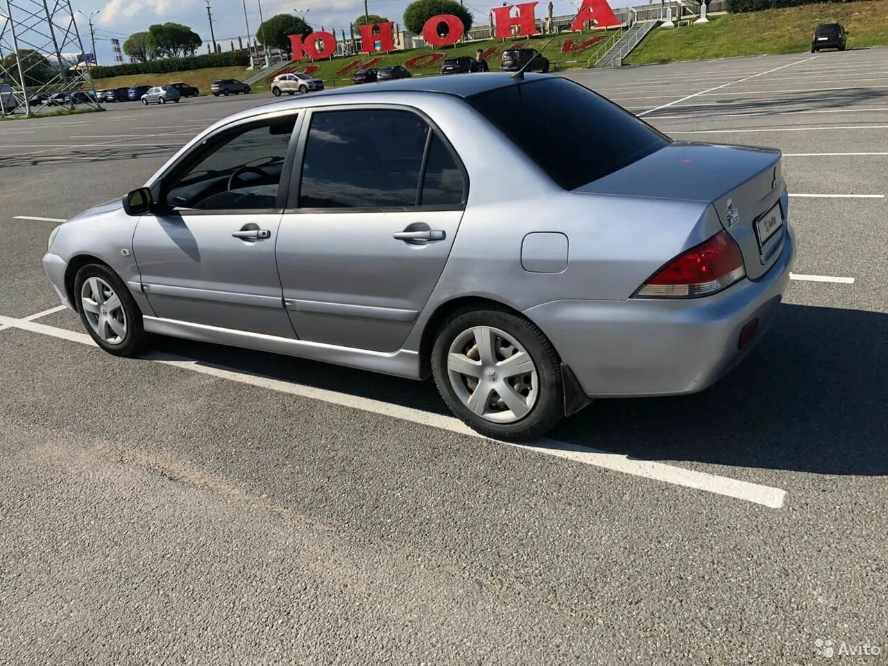 Mitsubishi lancer 2005 года. Mitsubishi Lancer 2005. Лансер 2005 года. Ланцер 2005. Мицубиси Лансер 2005 год гос номер.