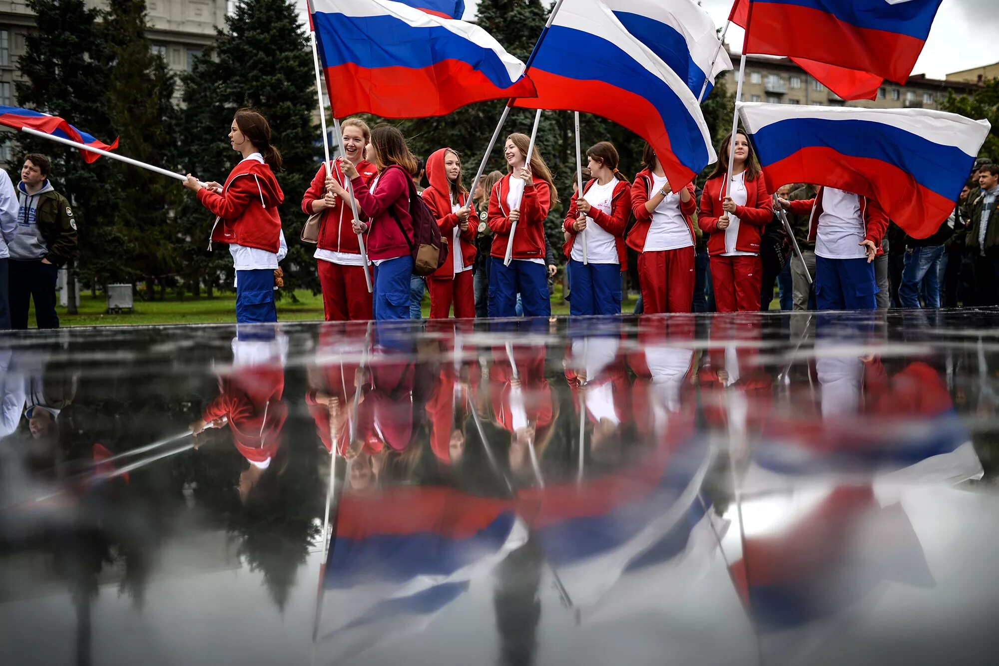 Фото государственного флага. День флага России. Флаг России праздник. Празднование дня флага России. Российский Триколор.