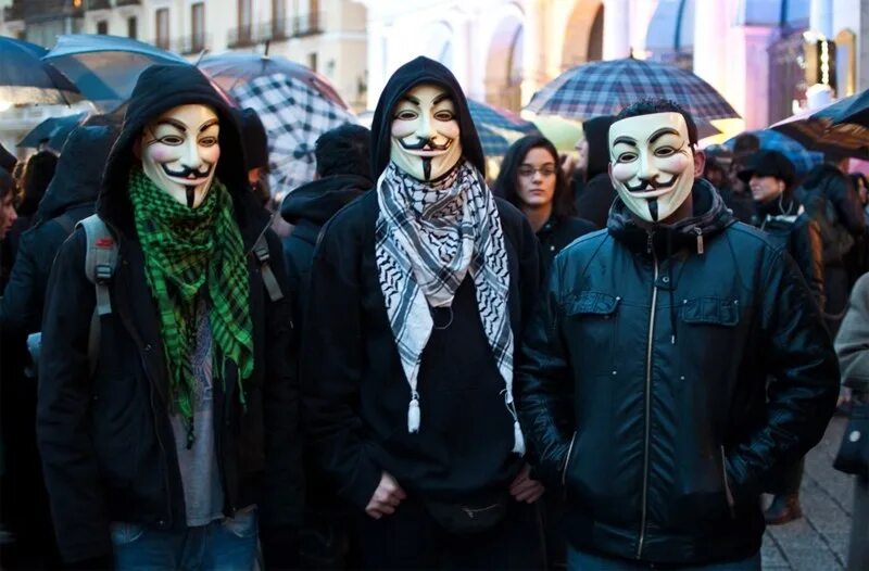 Два парня в масках. Группа хакеров анонимус. Анонимусы субкультура.