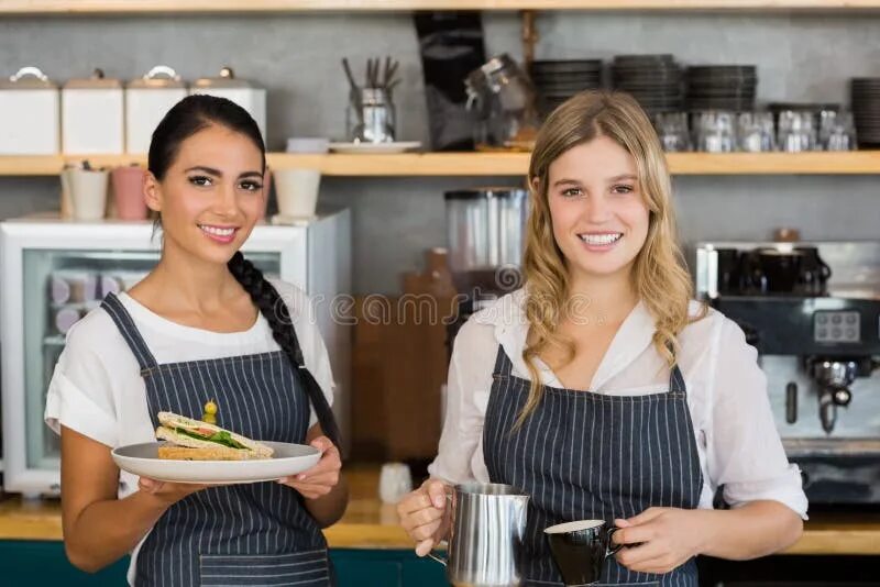 Portrait of Smiling Waitress Holding a Tray with Sandwiches Stock Photo - Image 