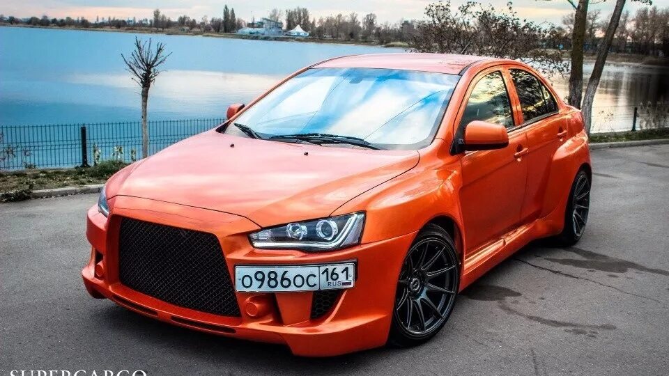 Купить тюнинг митсубиси. Мицубиси Лансер x10. Mitsubishi Lancer 10. Митсубиши Лансер 10. Тюнингованный Mitsubishi Lancer 10.