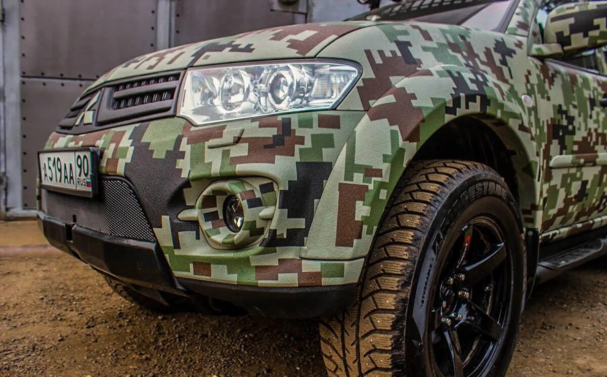 Пленка хаки. Mitsubishi l200 камуфляж. Митсубиси л200 камуфляж. Mitsubishi l200 Camo by line-x line-x. Лайн Икс камуфляж Митсубиси л 200.