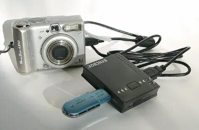 Как с фотоаппарата скинуть фотки на телефон