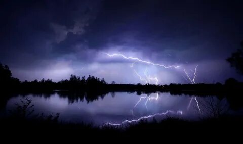 Bright Lightning Bolt Strikes Above a Stormy Sky. 