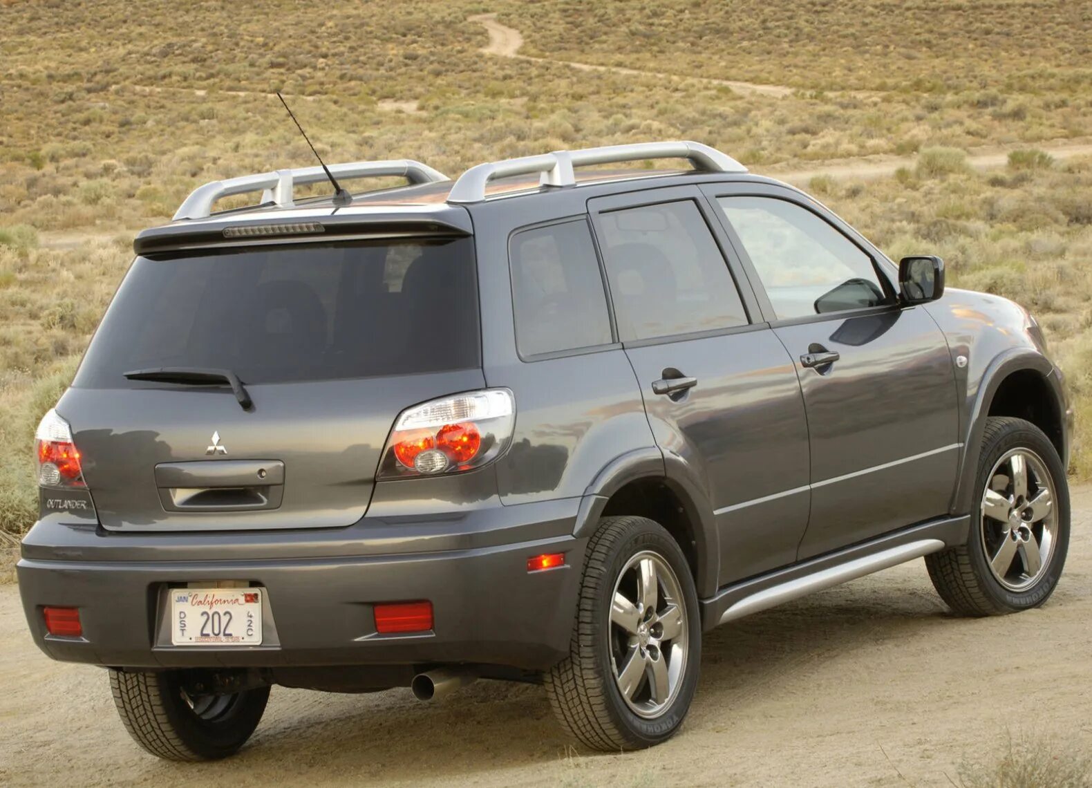 Mitsubishi outlander 2003. Mitsubishi Outlander 2006. Митсубиши Аутлендер 2006. Митсубиси Аутлендер 2002. Митсубиси Аутлендер 1 поколения.