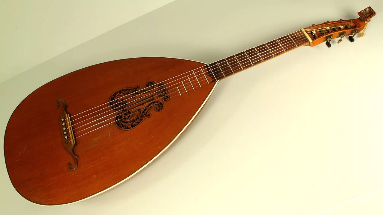 Lute - any plucked string instrument with a neck and a deep round back. (page 15