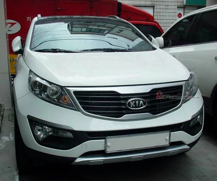 Kia Sportage 3 накладка на передний бампер. Бампера Киа Спортейдж 2013. Накладка переднего бампера Sportage III (2010-2014). Накладки на бампер Киа Спортейдж 3.