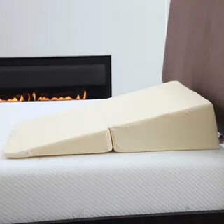 Приподнятым изголовьем