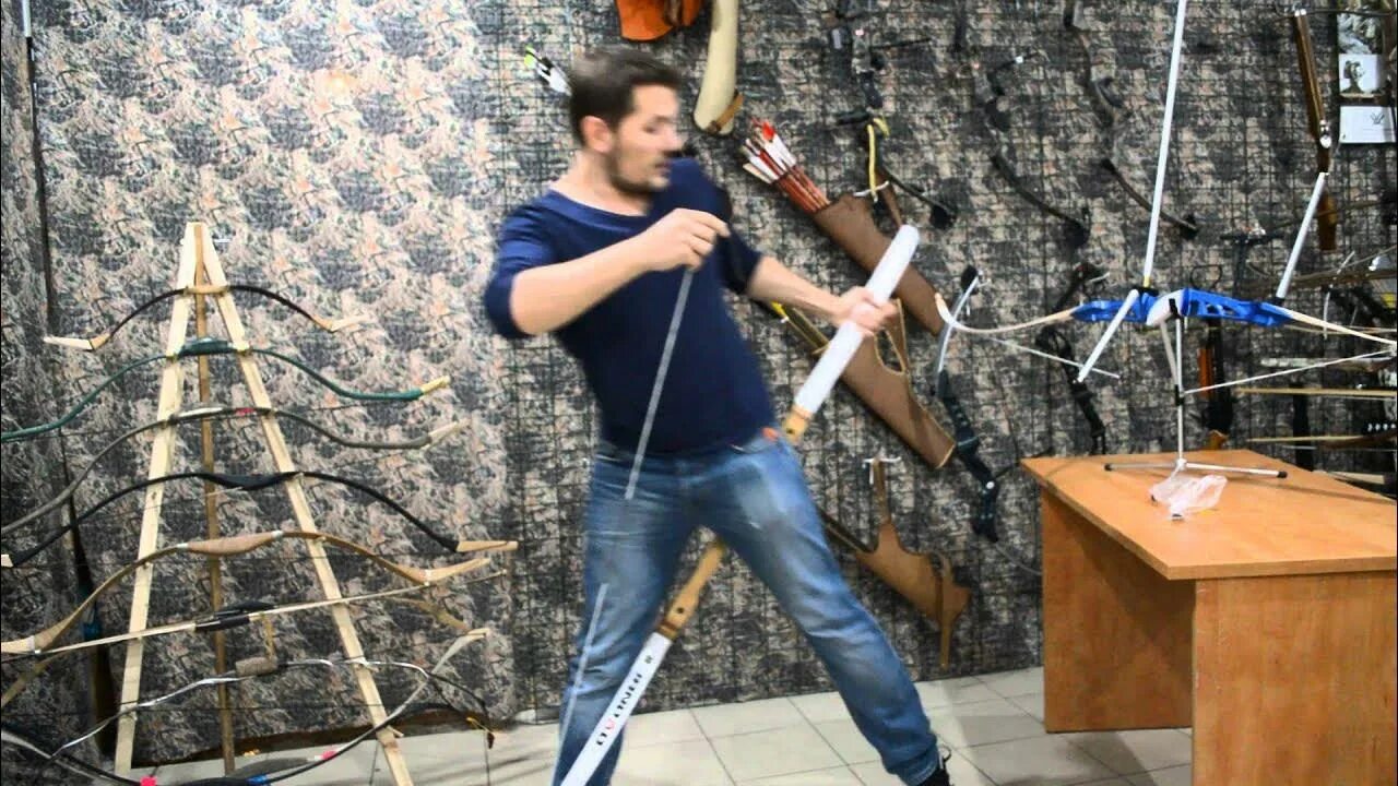 Сколько пальцев использует лучник для натяжения тетивы