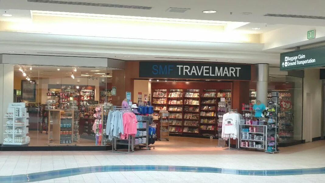 Travel mart. Трэвелмарт. Тревел март. Трэвелмарт логотип.