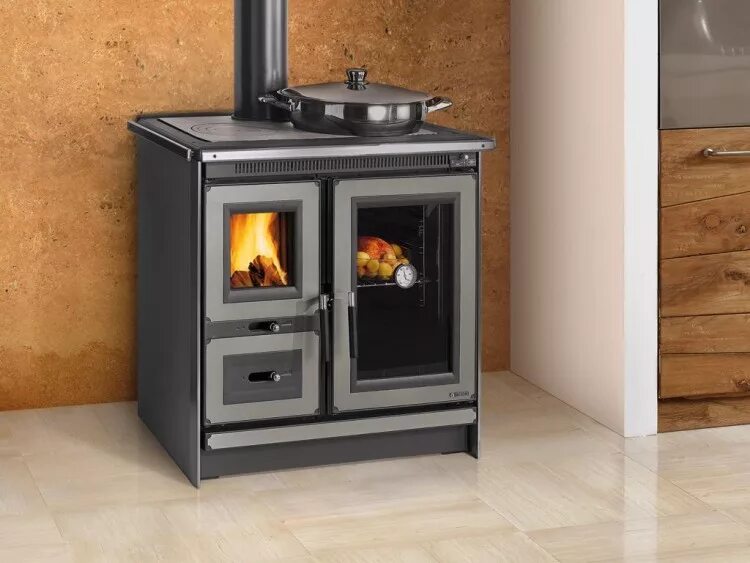 печь с варочной поверхностью для дачи. печь-камин la nordica. отопительно-варочная печь la nordica rosa liberty. отопительно-варочная печь lanorica. Prity wood burning cooking stove cast iron top oven cooker solid fuel.