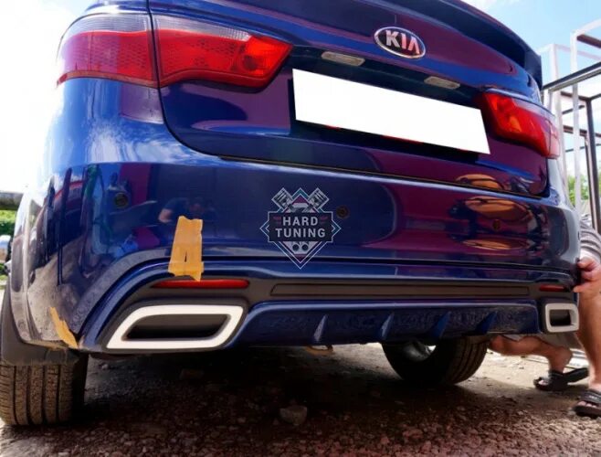 Диффузор рио 3. Диффузор киа рио 3. kia rio 3 диффузор заднего бампера. диффузор киа рио 3 седан. задний диффузор киа рио 3.