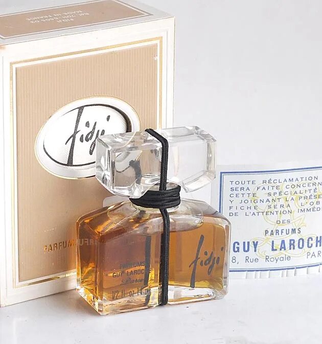 Фиджи оригинал купить. Fidji EDT 50ml. Guy Laroche Fidji 1966. Guy Laroche Fidji (w) Parfum. Guy Laroche Fidji 14 ml.