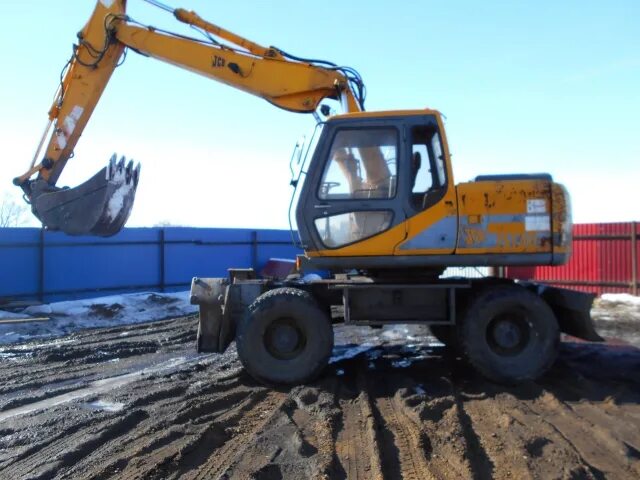 Купить экскаватор бу полноповоротный. JCB js 130w. Полноповоротный экскаватор JCB 130. JCB 130 колесный. Экскаватор полноповоротный JCB-130 гос номер.