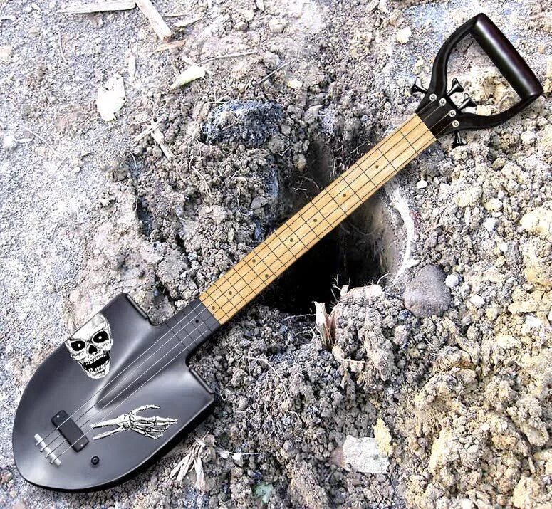 Глупая на гитаре. Гитара лопата. Гитара из лопаты. Электрогитара лопата. Странные электрогитары.