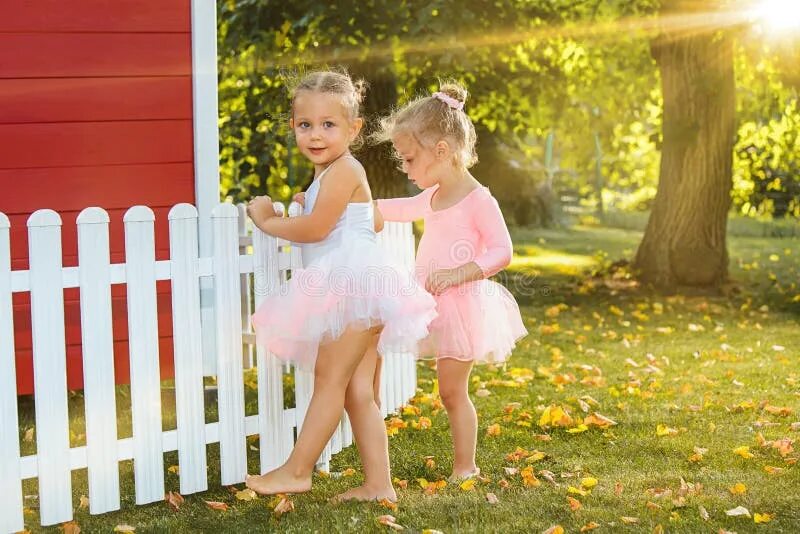 Little girls текст. Две девчонки на заборе. Playground girls. Little Diana Plays on the Outdoor Playground, three little Kittens Song.