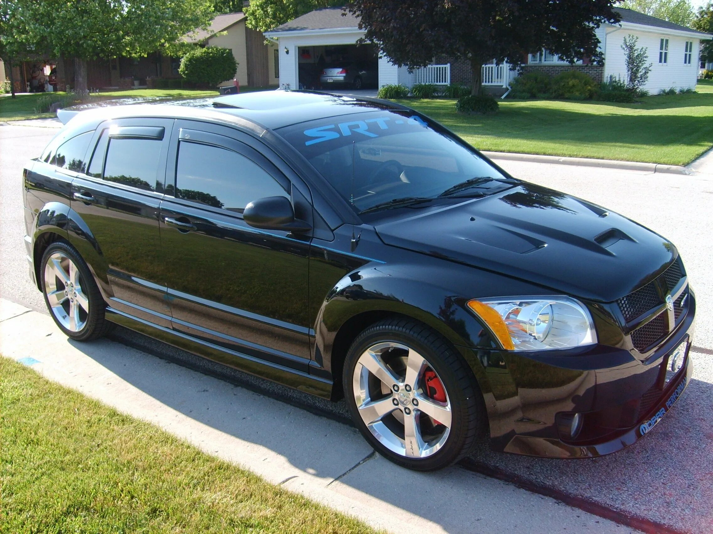 Dodge caliber купить. Dodge Caliber 2007 Tuning. Dodge Caliber 2008. Додж Калибер 2008. Тюнингованный Додж Калибер.