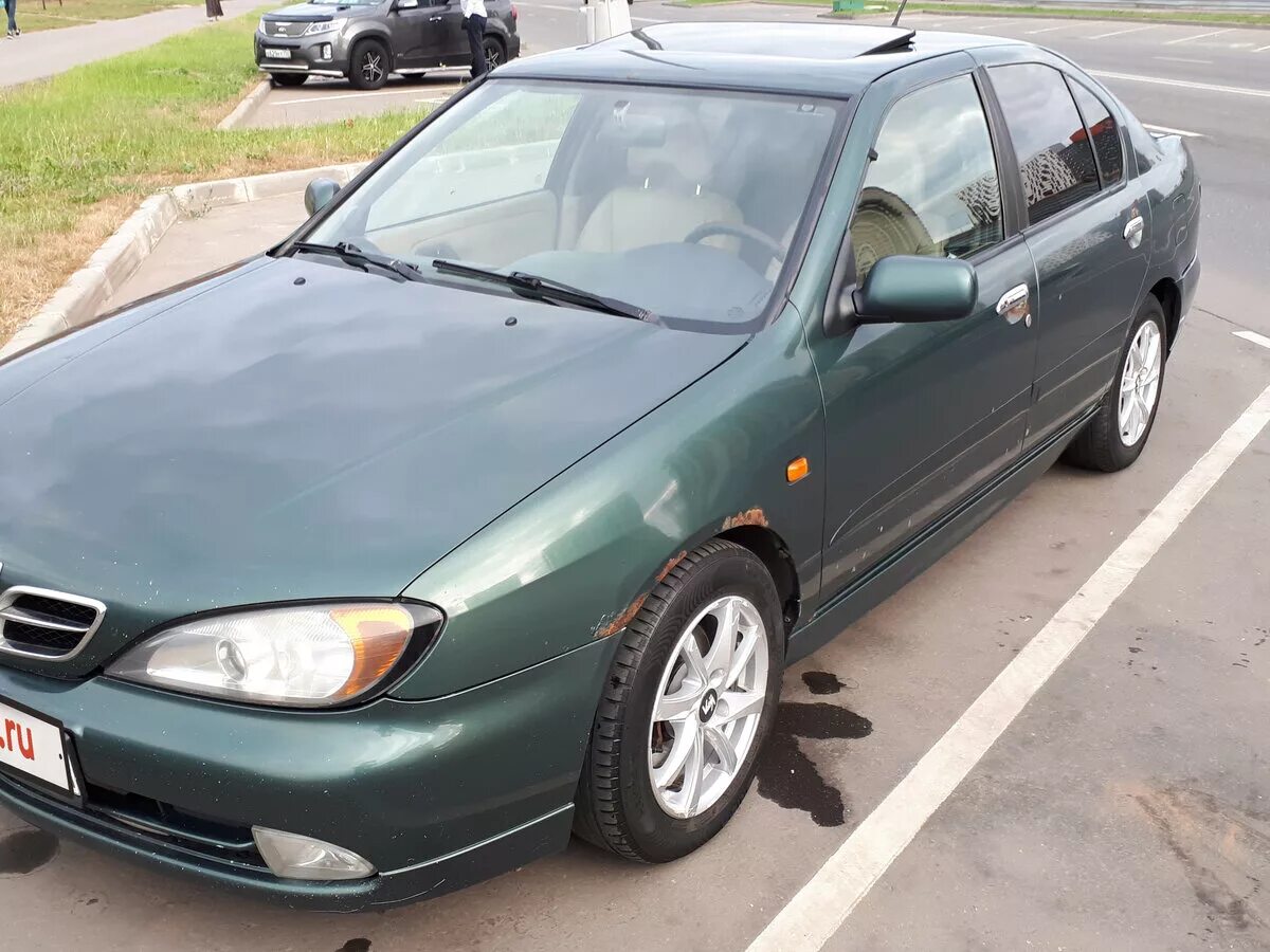 Ниссан примера 2000 год. Nissan primera II (p11). Nissan primera II (p11), 2000. Nissan primera p11 зеленая. Nissan primera седан 2000.