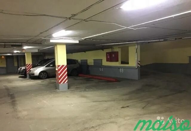 Машиноместо 16. Машиноместо, 16 м². Паркинг в элитном доме Питера. Ветеранов 130 СПБ. Подземный паркинг на проспекте Андропова 42.