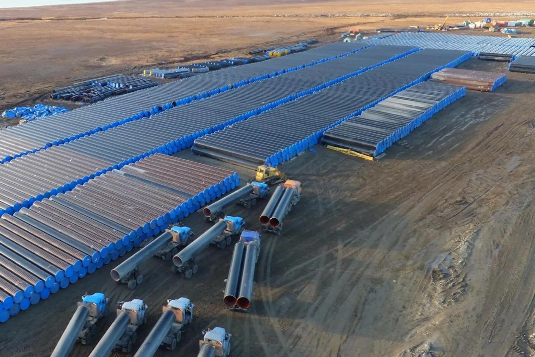 Площадка складирования труб. Площадка для хранения труб. склады для нефтяных труб. площадка складирования.