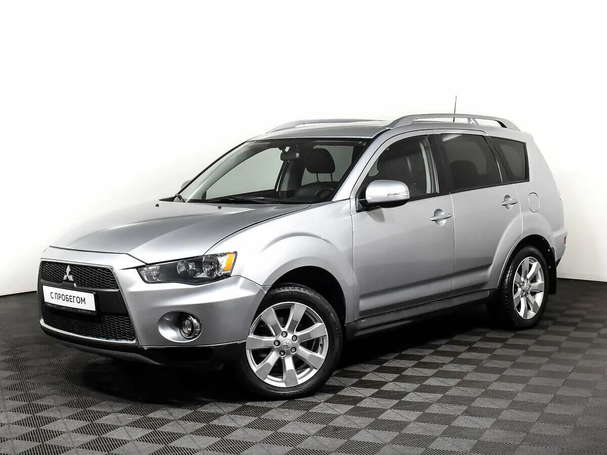 Мицубиси минусы. Mitsubishi Outlander 2010. Outlander 2010. Аутлендер внедорожник 2010.