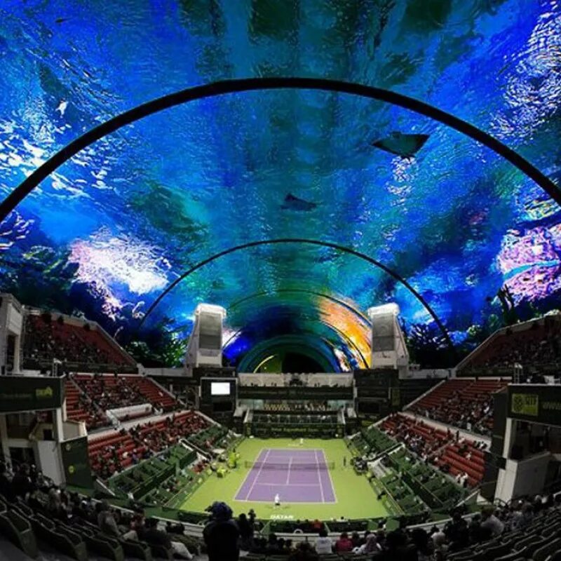Стадионы корта. Подводный теннисный корт в Дубае. Подводный стадион в Дубае. Теннисный корт Уэмбли. Футбольный стадион в Дубае.