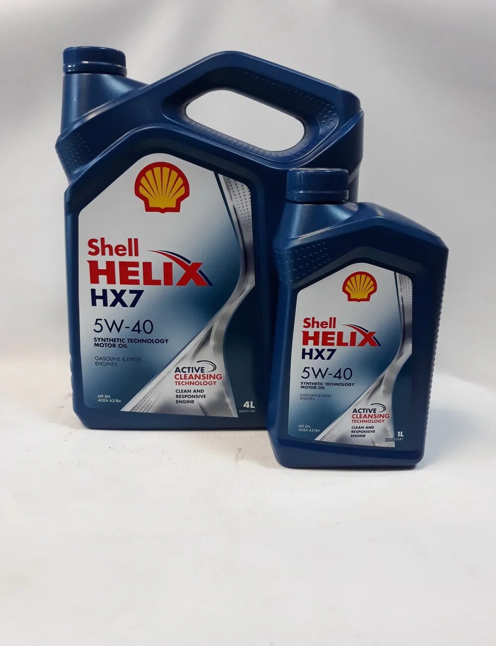 Шелл Хеликс 5w40 синяя канистра. Шелл Хеликс hx7 5w40 синтетика. Shell hx7 10w 40 5л. Shell Helix 5w40 полусинтетика. Масло hx7 5w40