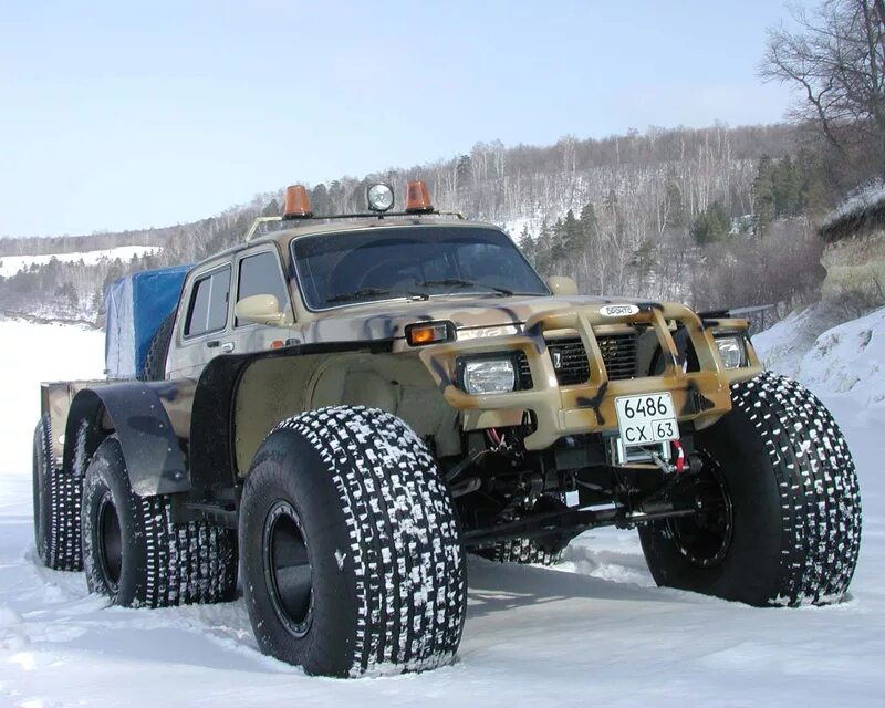 Болотоход мт 08р. Уаз хантер болотоход. Болотоход шаман 8х8. Автомобили низкого давления. Вездеход бтх-2.