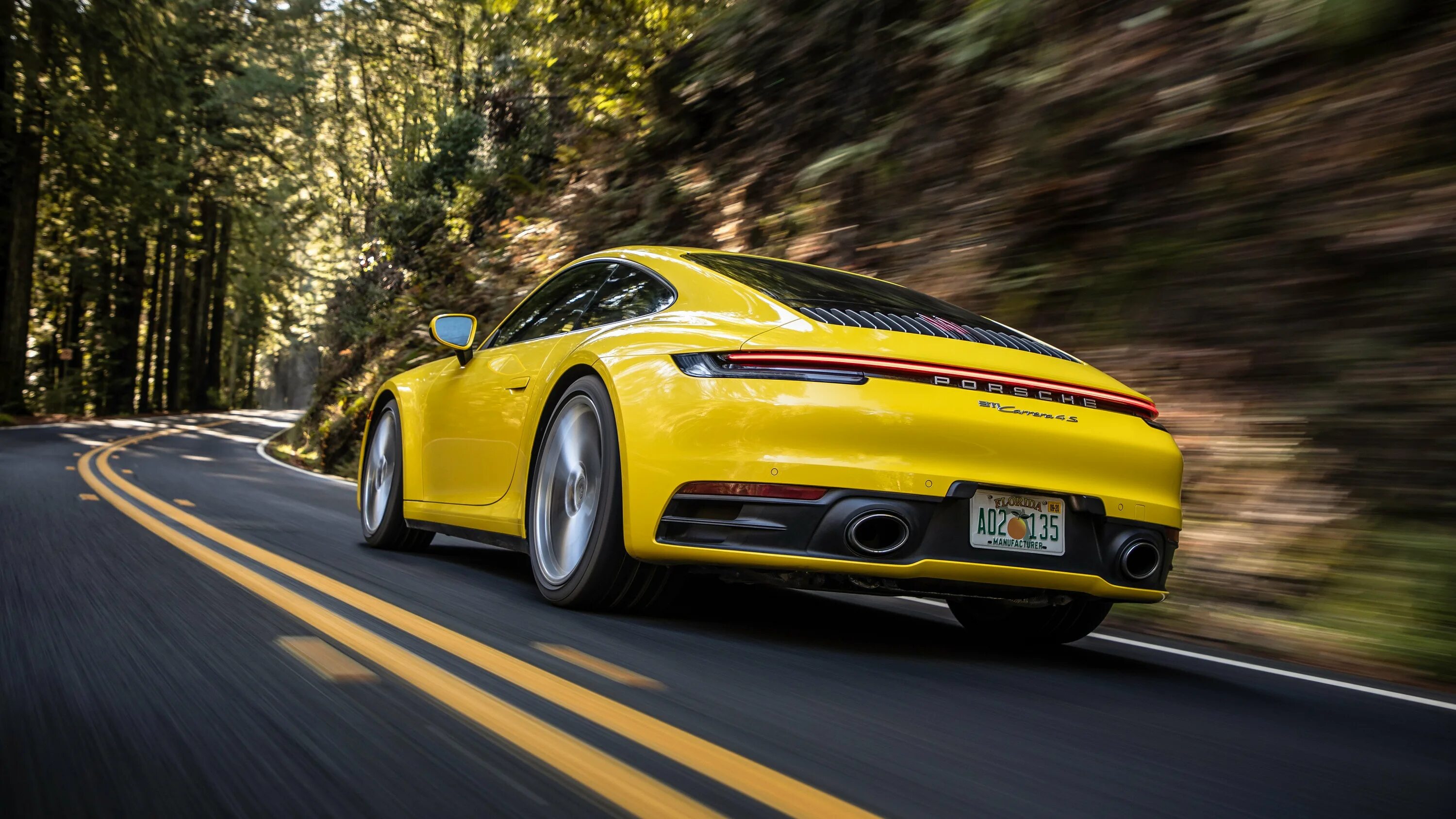 Порше 911 Каррера 4s 2020. Порше Каррера 911 4s желтый. Porsche Carrera 4s 2021. Porsche 911 2020 Yellow.