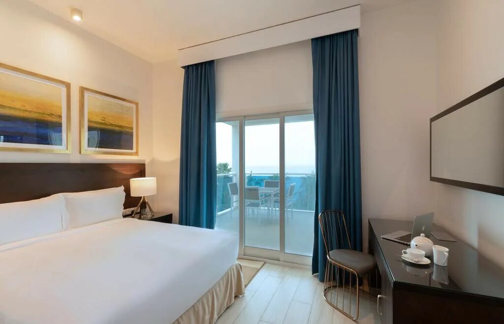 Radisson blu resort 5 оаэ фуджейра. Отель radisson blu resort fujairah. рэдиссон блю резорт оаэ фуджейра. рэдиссон блю фуджейра 5. fujairah radisson blu fujairah resort 5.